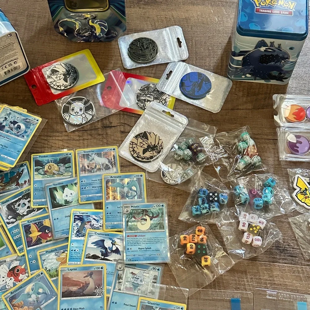 Pokemon Card Collection with Tins and Accessories 25 card Mystery Tin plus bonus